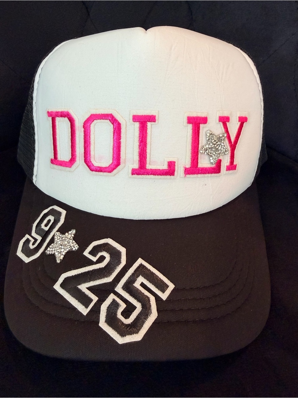 DOLLY PARTON Trucker Hat - White & Black with Pink Lettering.